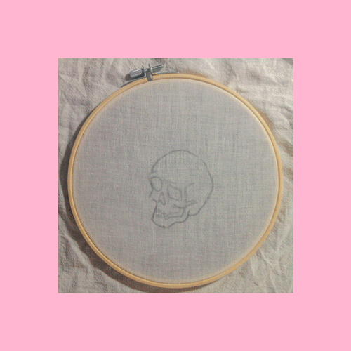 Progress gif of skull embroidery